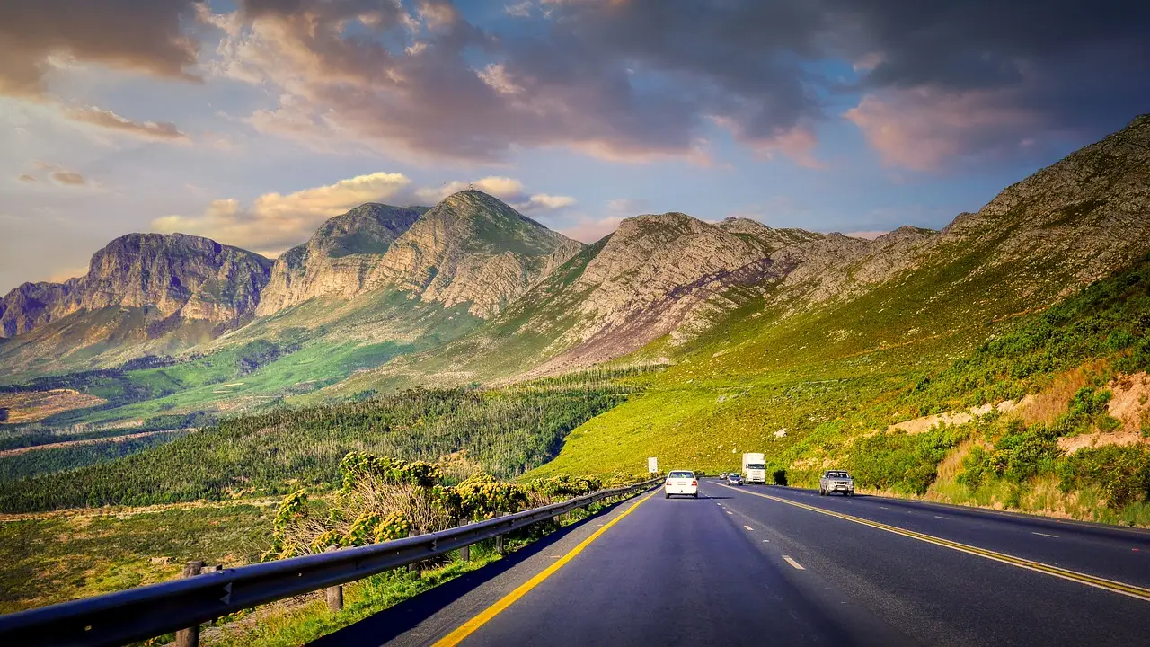 road, vehicles, mountains